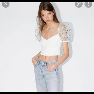 Zara white crop with polka dot poofy shoulders.